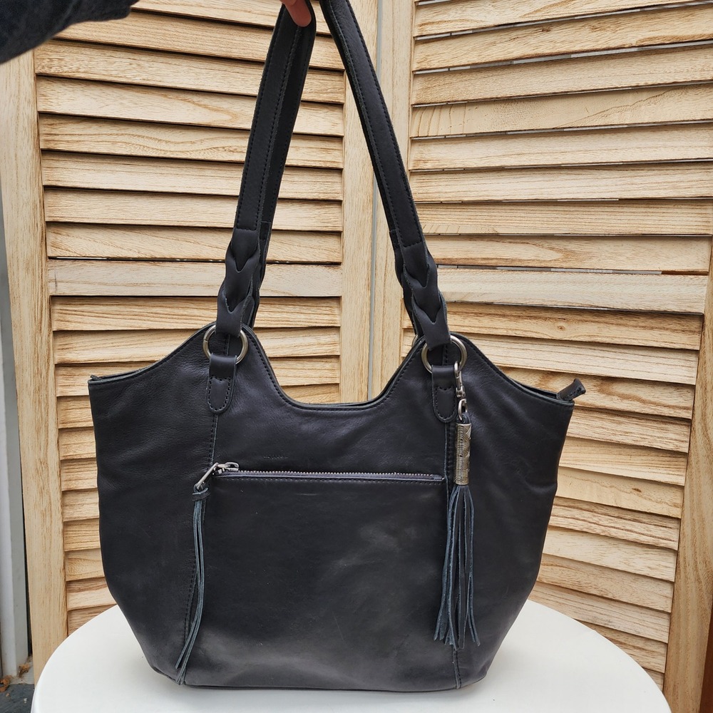 The Sak Black Leather Shoulder Bag Tote Purse Braided Tassel Western Cowgirl